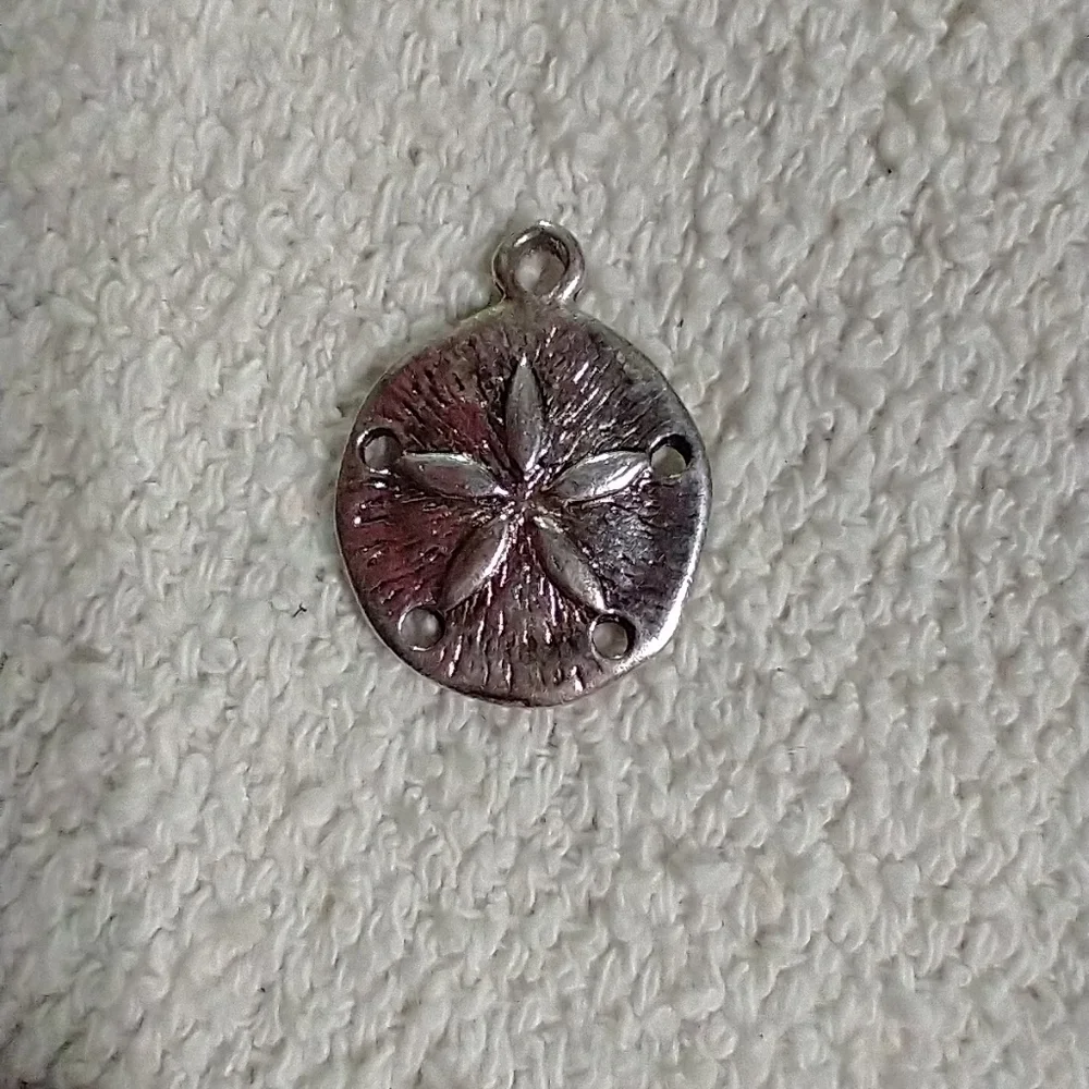 Silvertone sand dollar pendant